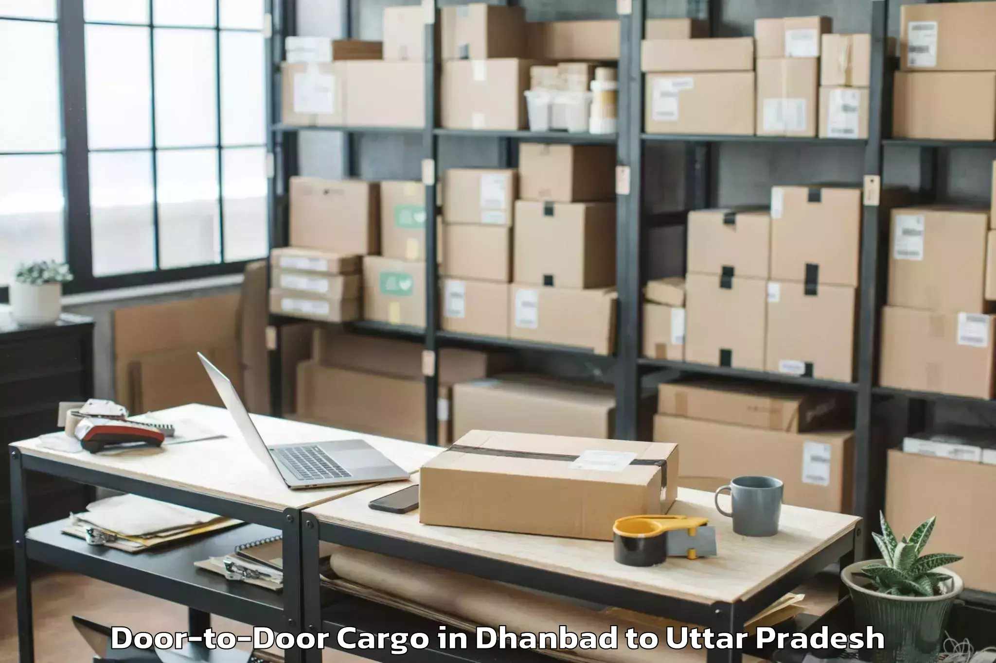 Reliable Dhanbad to Haraiya Door To Door Cargo